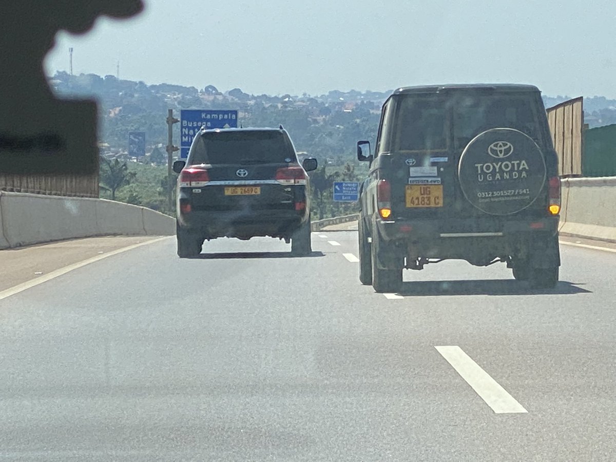 SpireJim's tweet photo. On Thursday, I was driving behind these two cars (UG 4183C &amp;
UG2689C) on Entebbe Express Highway). They moved very slowly all the way, blocking both lanes - with a soldier pushing out his hand to warn me not to overtake them. After paying to use the road! https://t.co/x4CTDNDvhV