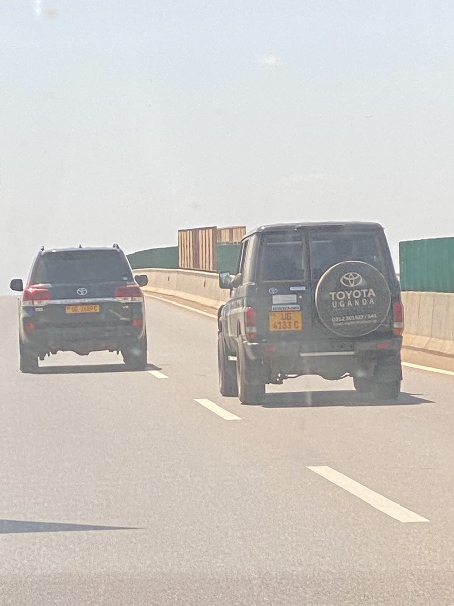 SpireJim's tweet photo. On Thursday, I was driving behind these two cars (UG 4183C &amp;
UG2689C) on Entebbe Express Highway). They moved very slowly all the way, blocking both lanes - with a soldier pushing out his hand to warn me not to overtake them. After paying to use the road! https://t.co/x4CTDNDvhV