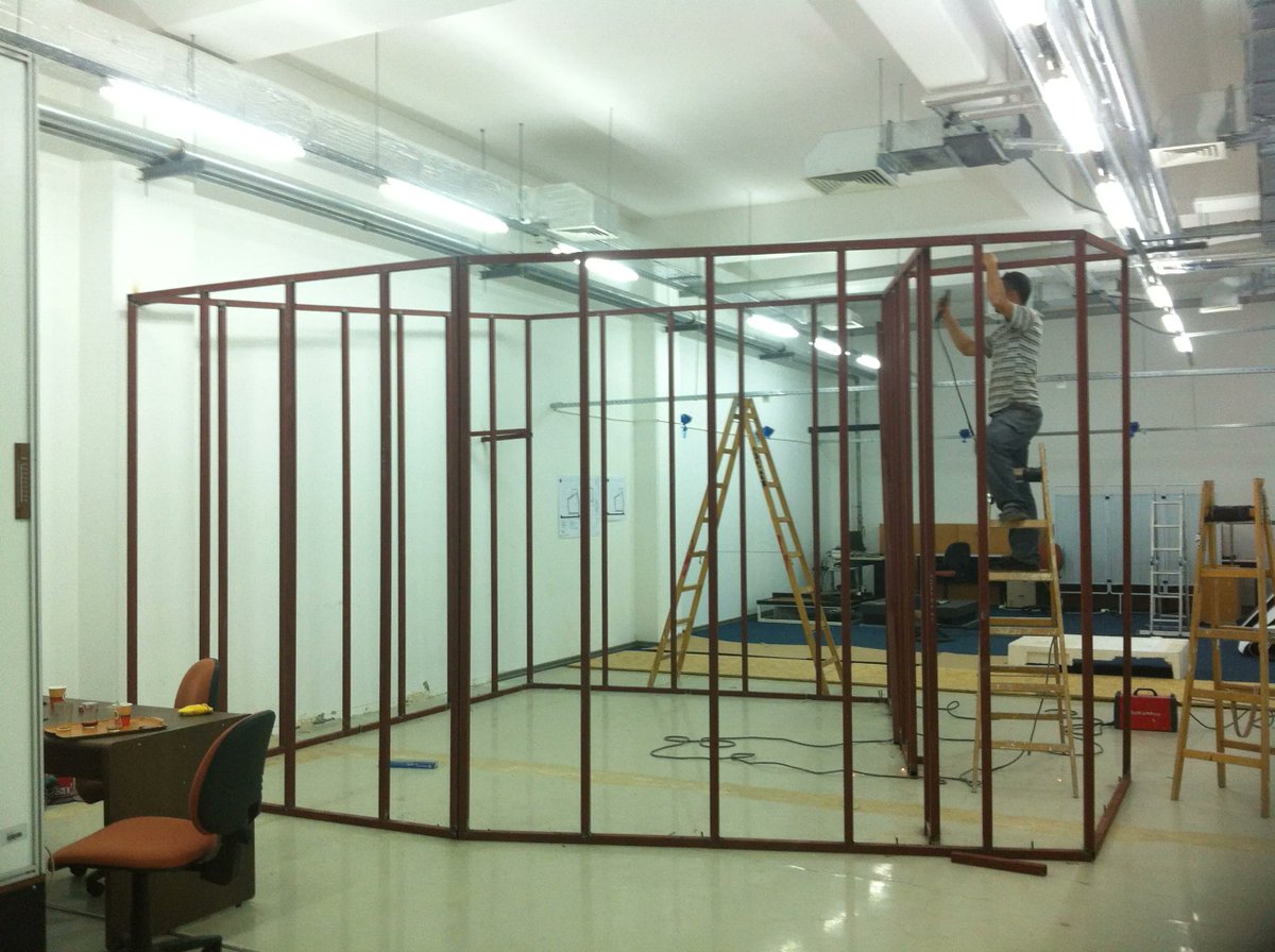 metusparg's tweet photo. METU SPARG lab being built 9 years ago today. It took a lot of patience to explain to the builders why they simply cannot build parallel walls and why the ceiling had to be slanted. #tbt #audio #research #acoustics #sound https://t.co/nw95TOUKkv