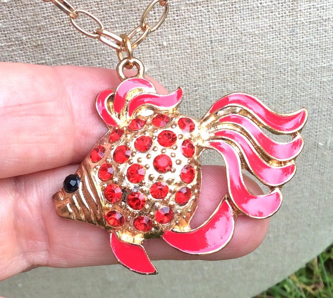 GothicGlass's tweet photo. Excited to share the latest addition to my #etsy #etsycanada #etsyjewelry shop: #Vintagejewelry #RedEnamelFish #fishNecklace #etsySALE #Tropicalfish #koi #FishPendant #Rhinestone #CrowVanityJewelry #Canada #FreeShipping #ruby #christmasinjuly https://t.co/LIIrnNEVTR https://t.co/TeHWyOztOf