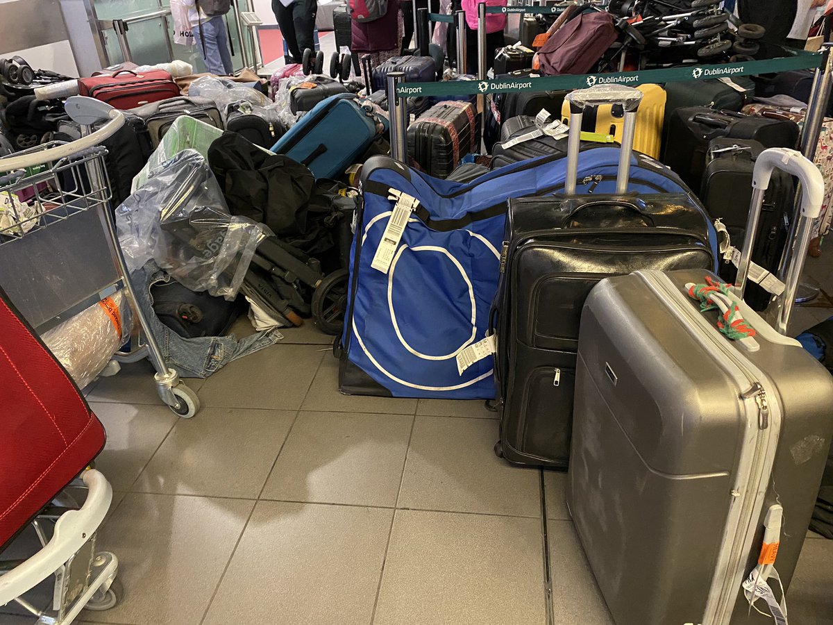 DavidWRCampbell's tweet photo. @DublinAirport needs to sort its baggage, these bags between carousel 7 and 8 in terminal 1 smell horrific due to how long they’ve been rotting, and covered in dust too. Contacted someone with their number on their bag and they’ve been there months! https://t.co/AfBtyf6Cyr