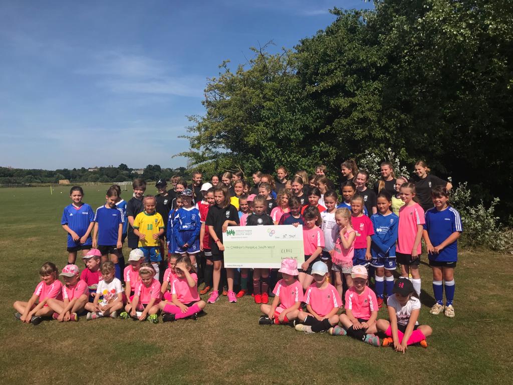 Markgrinter73's tweet photo. Super proud of the girls of frys jfc giving the children's hospice southwest a cheque for £1802 meaning they have raised over £3000 in the last couple of years and frys jfc in total over £4000 for #CHSW #Hergametoo #Frysjfc https://t.co/koHicOMOx2