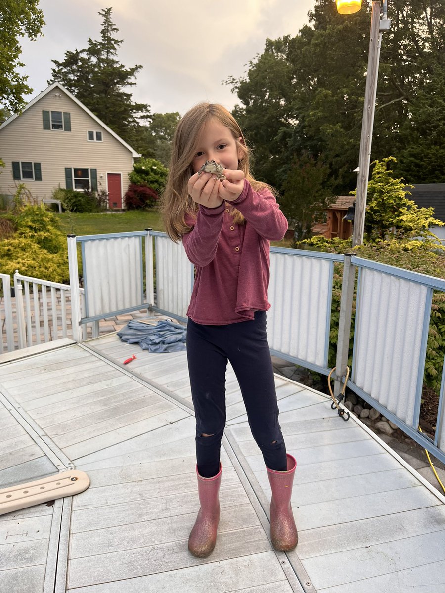 Farm girls get up at 5am and help their dad remove the frogs out of the pool.