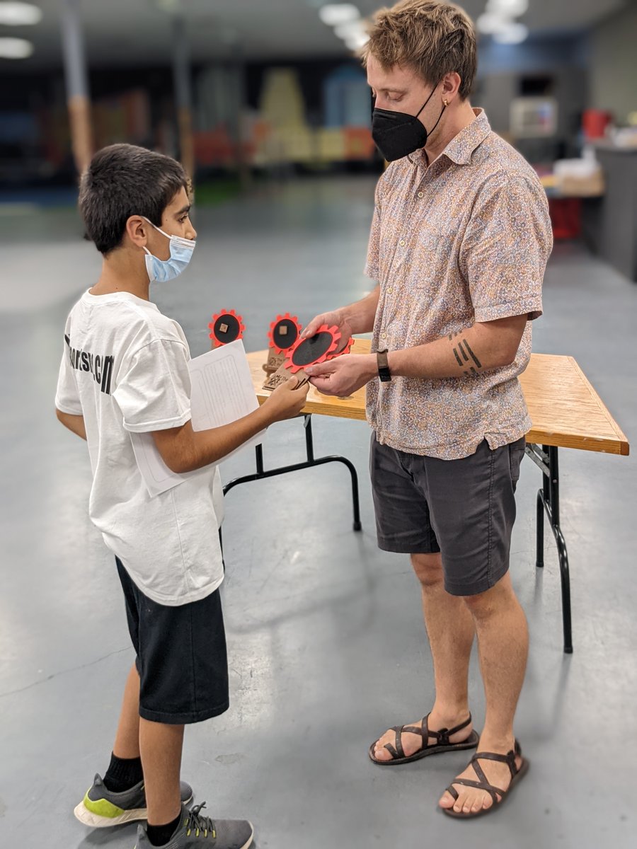 makeracademync's tweet photo. Students are being awarded their badges and badge stands for completing the Beginner Mechanics class, Art Machines!

We have a "Gearing up!" program where students can earn badges as they take classes and unlock more advanced classes as they earn core competencies is making. https://t.co/4NeKdqEfRM