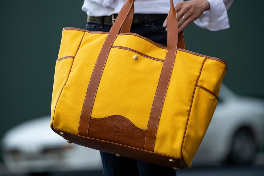 “To the gym – to the office – to the stop at the deli on your way home or to the beach on that perfect sunny Saturday afternoon - the Market Tote will always be there by your side.”⁠
⁠
- John Truex, Creative Director