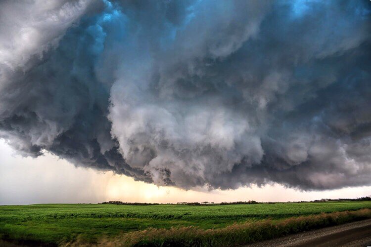 Out of all the photos I took on Friday this might be my favorite.  It isn’t flashy or have foreground etc.  I don’t think I have ever been in this spot before looking straight up a rotating wall cloud looking into the blue glow.  #skstorm