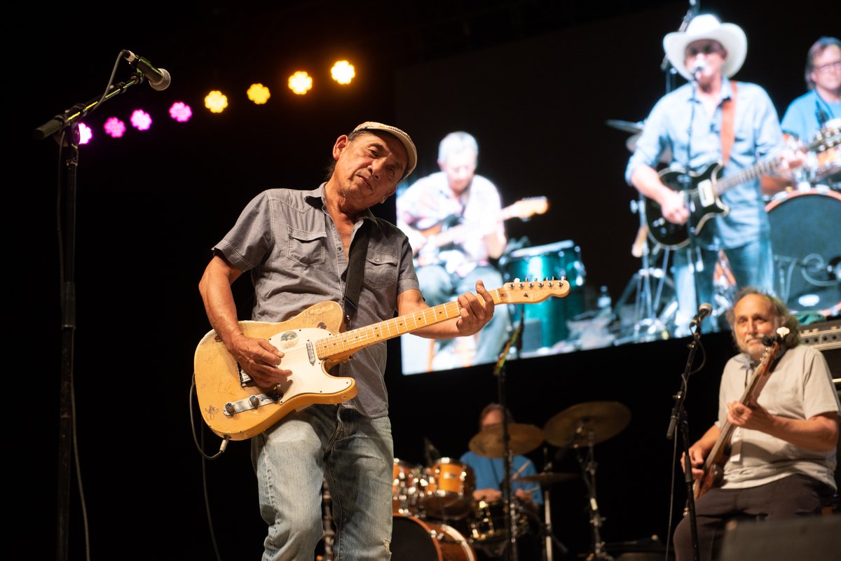 Guitarist Ben Han of the <a href="/reddirtrangers/">Red Dirt Rangers</a> on the main stage of the Woody Guthrie Folk Festival. Okemah, Oklahoma. July 14, 2022. <a href="/nondocmedia/">NonDoc</a> <a href="/WoodyFest/">Woody Guthrie Fest</a>  #woodyfest #folkmusic #folkfestival #reddirtmusic #oklahomamusic #gigphotography #musicphotography