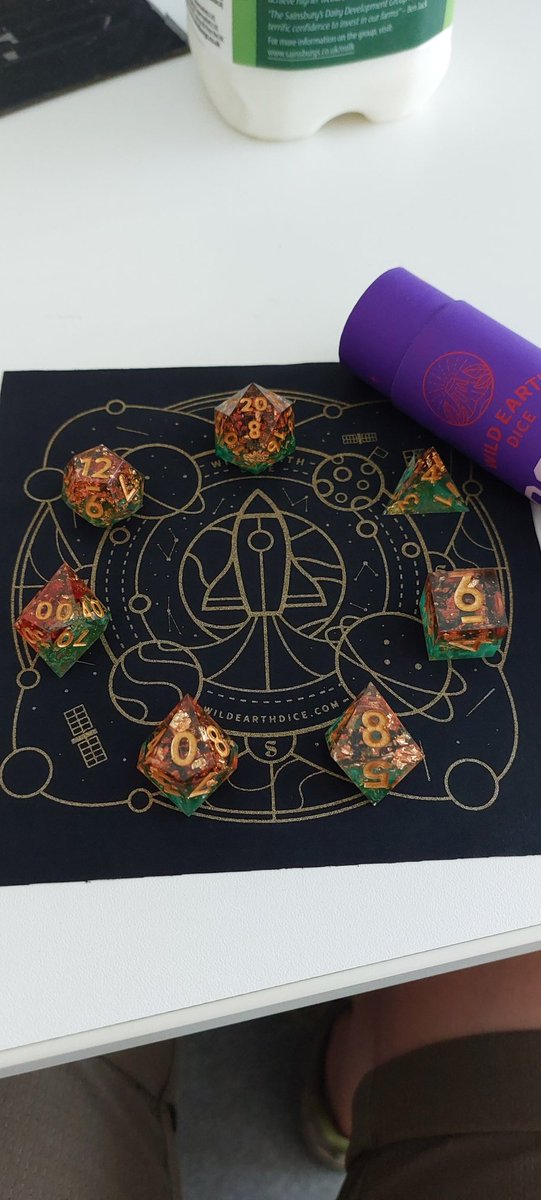 rliggetfalconer's tweet photo. My beautiful #CosmicCollection #dice from @wildearthdice arrived! Now to figure out which of my characters gets to roll with these https://t.co/BuBCtFPOEm