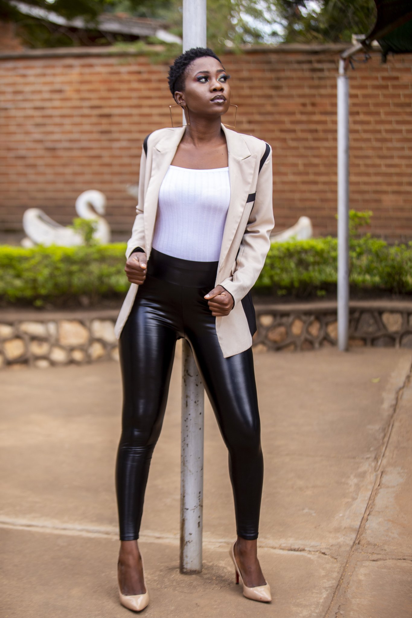 Leather leggings and shiny nylon windbreaker 