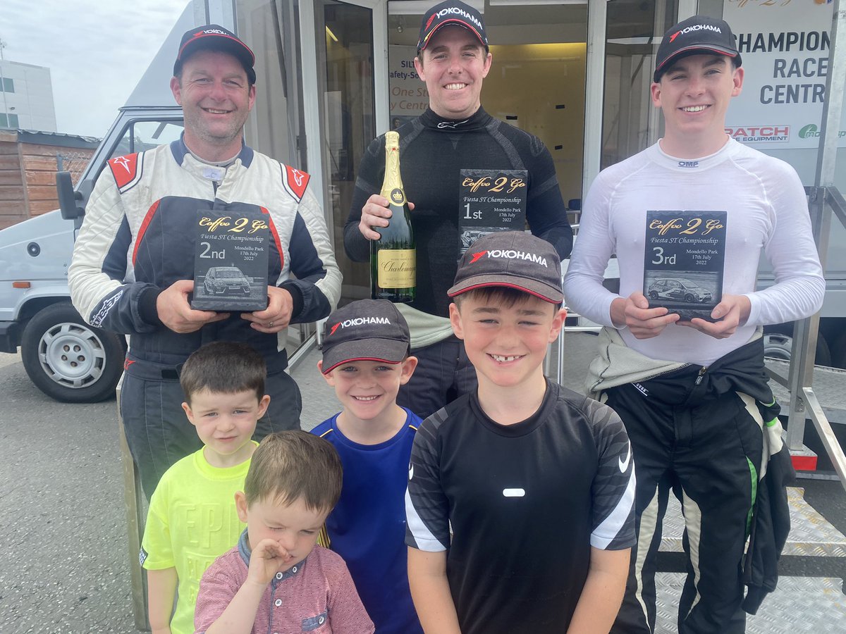 MondelloFiestas's tweet photo. The champ is back! 2021 #Coffee2Go Fiesta ST champion Graham McDonnell returned@to the class at the weekend- and win race one from pole! Also pictured are series leader @edpeterson2000 (L) and Dave Maguire Jnr- who took P3 in his second ever car race! (And a few young fans too!) https://t.co/ZzwvtT9Nxn