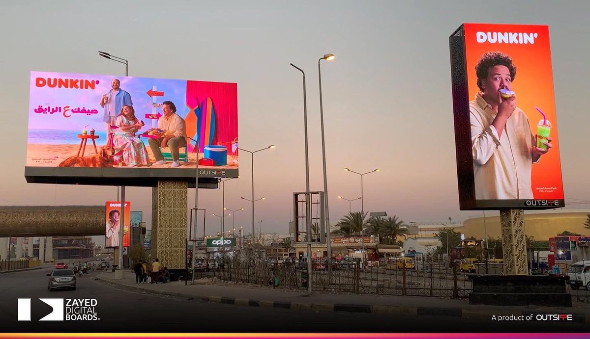 outsiteooh's tweet photo. The latest #campaign of @dunkindonuts' featured by #MostafaGharieb, #HatemSalah, and #RahmaAhmedFarag on our new screens #ZayedDigitalBoards, the first synchronized screenplay in #Egypt. Still, there is much more #brands to join the best #DOOH storytelling on #Cairo's roads. https://t.co/Cuq0wMXzqu