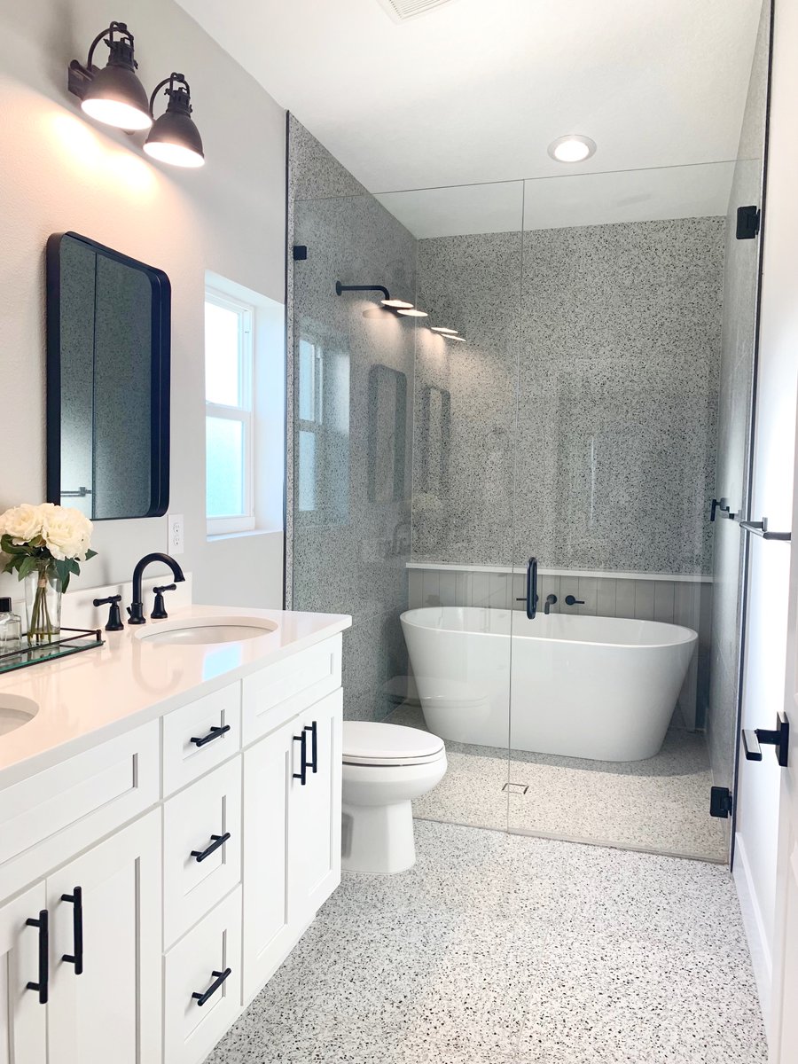 Project Spotlight:
This stunning spa-like retreat was inspired by European references and features terrazzo tiles seamlessly installed from floor to ceiling behind the true star, the beautiful free standing soaking tub. 
#ramoscompanies #bathroomrenovation  #tampahomes