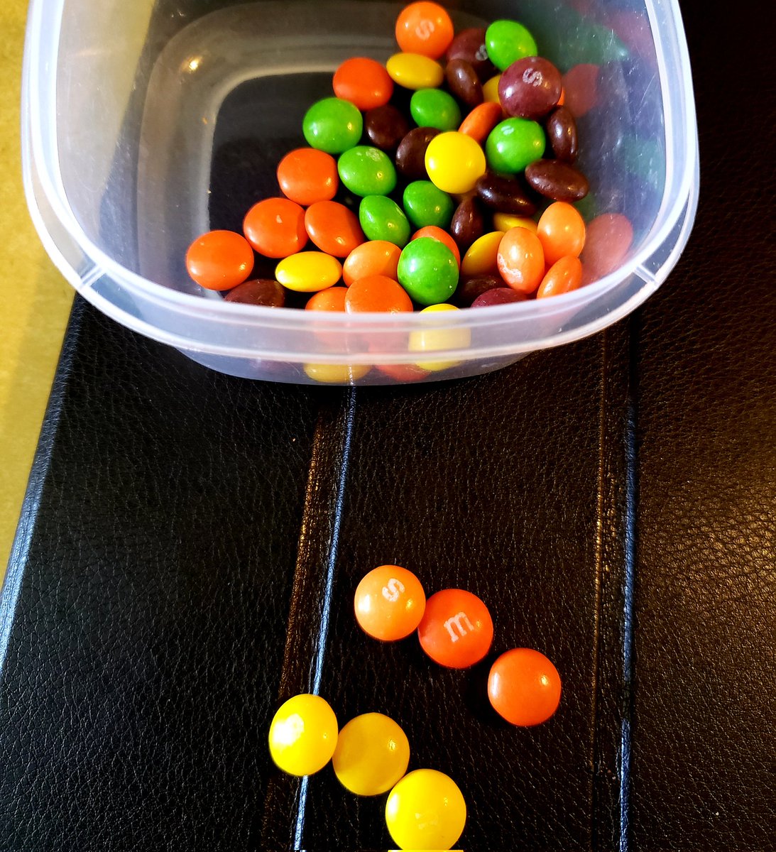 AnthonyPitalo's tweet photo. The Skittles should never be kept with the Reese's Pieces and M&amp;Ms... fucking diabolical. https://t.co/bTNv6mNKaM