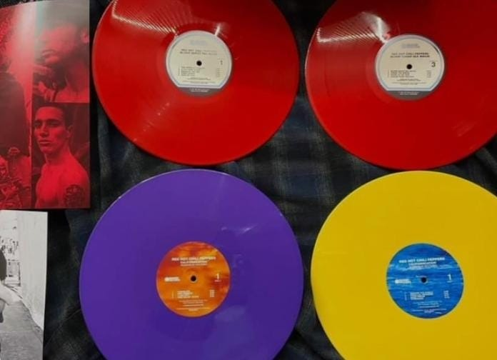 RHCPStuff's tweet photo. WARNING! ⚠️⚠️⚠️
Californication was advertised as Orange/Blue vinyl. Instead, Walmart shipped a Purple/Yellow version. https://t.co/MpV4EIaVMR