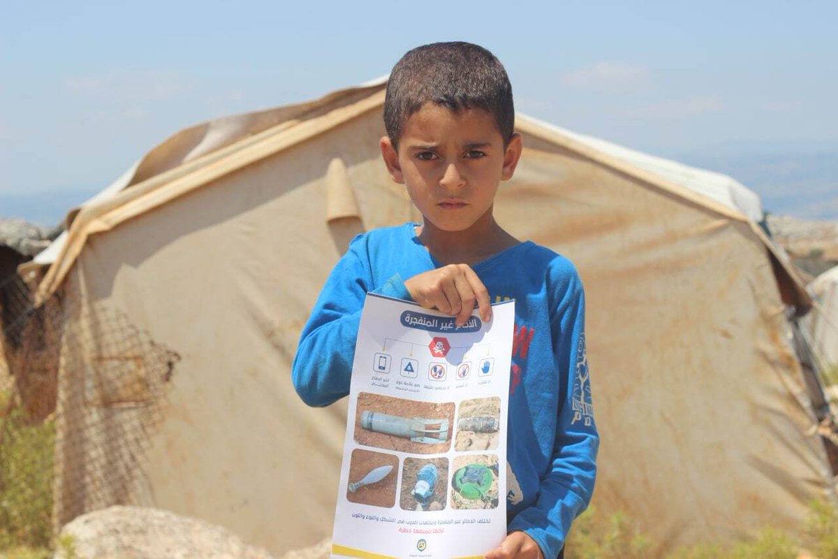SyriaCivilDef's tweet photo. Our little hero, Ali Al-Omar, who lives in #AlShorfa camp in #Azmarin village west of #Idlib, came upon a strange object while playing with his friends in the camp. He asked them not to touch it and immediately told his father, who in turn reported it to our teams.
#WhiteHelmets https://t.co/6vGmTbtNtk