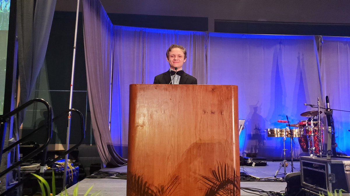 palmbeach4h's tweet photo. Proud to watch #palmbeach4h senior Wolfgang Oschmann recite the pledge of allegiance and the #4H pledge at the opening session of the @agagents #NACAA Conference. Wolfgang has been a @Florida4H member for 13 years and will be studying film at Eastern KYUniversity. #trueleaders https://t.co/r7vuX1Bu45