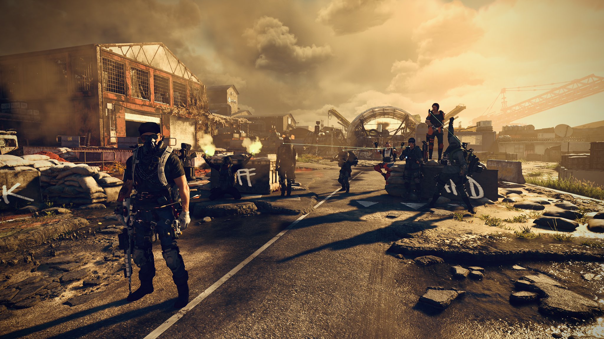 Agents of The Division Raid Group posing in sepia toned dystopican street.