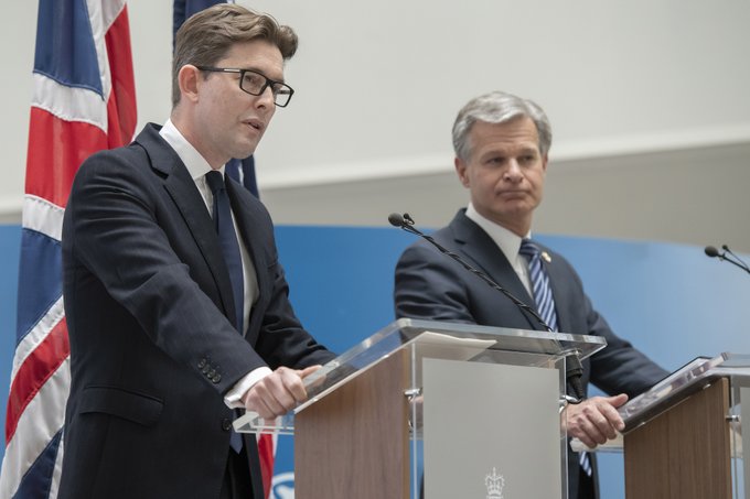 MI5 Director General Ken McCallum (left) and FBI Director Christopher Wray (right) appear at a July 6 event in London.