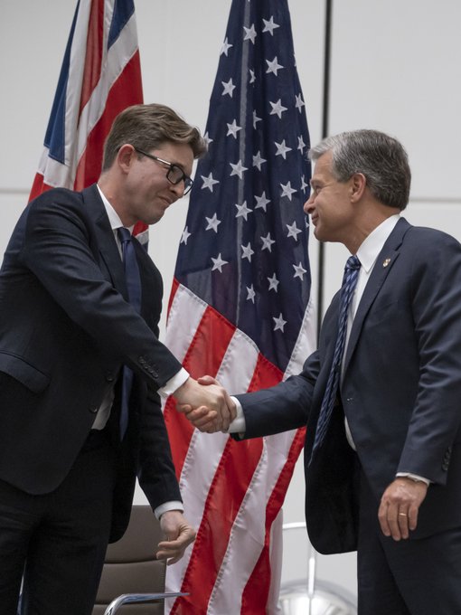 [5:34 PM] Oprihory, Jennifer-Leigh (OPA) (CON) MI5 Director General Ken McCallum (left) and FBI Director Christopher Wray (right) shake hands at a July 6 event in London.