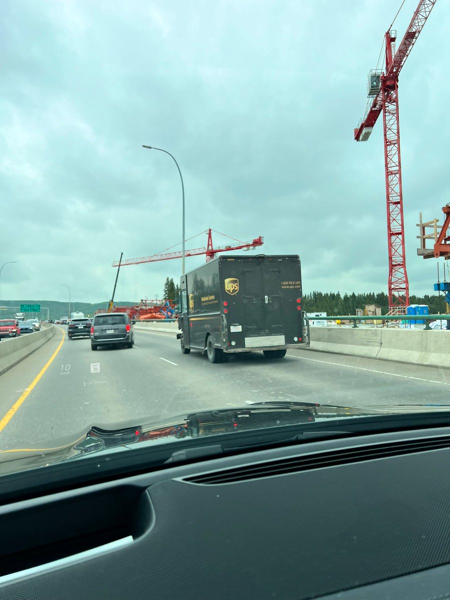 SmileyYYC's tweet photo. Poor #ups guy stalled on a busy bridge here in #Calgary
*AVOID* #StoneyTrail SB heading to #banff #CalgaryTraffic #yyc https://t.co/DoJhiWGv3T