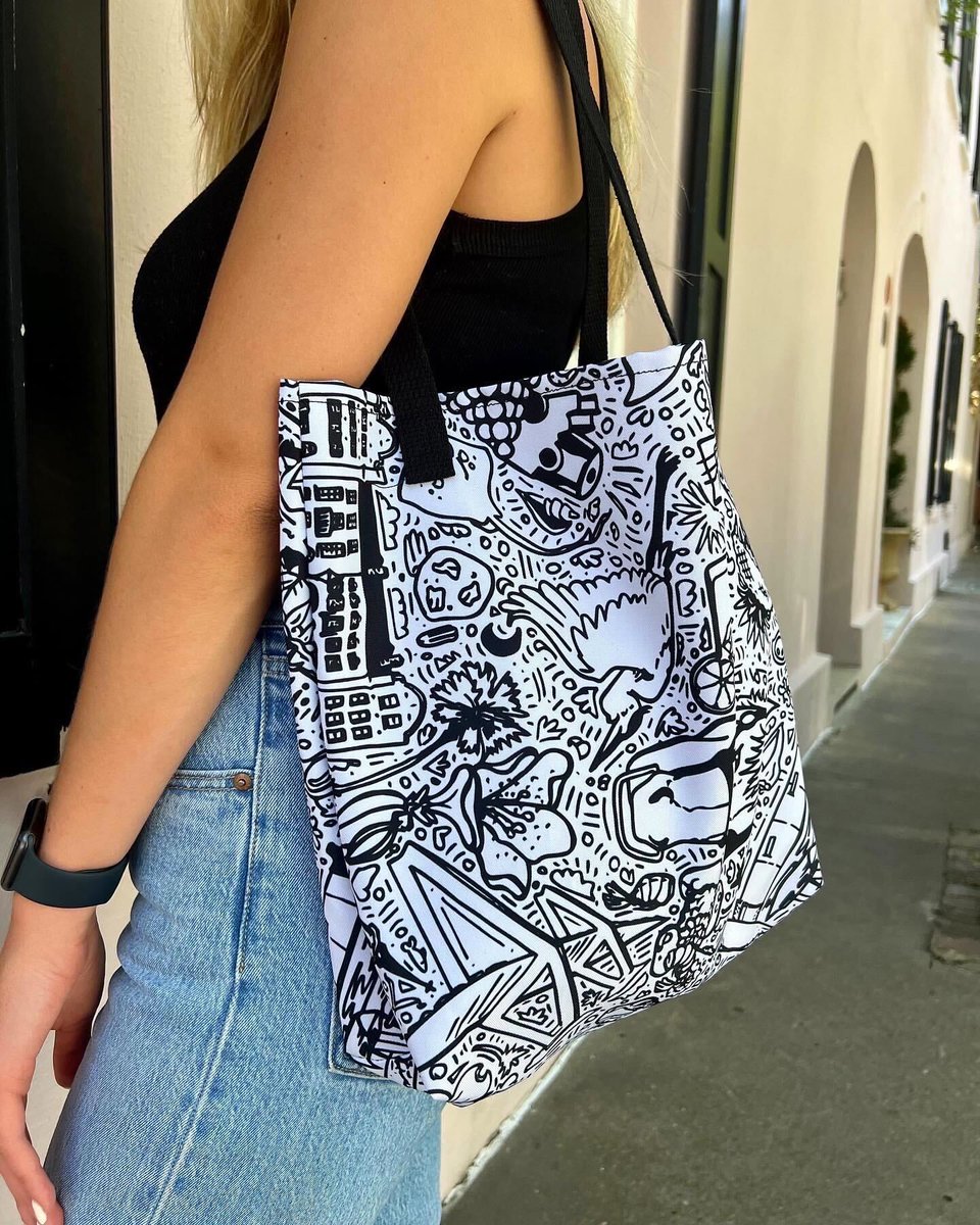 <a href="/thechstoday/">CHStoday</a> City Editor Lexa sporting a tote bag that she recently purchased from our online store <a href="/sixandmain/">sixandmain</a> – featuring a unique, quintessential Charleston design created by local artist J. Mars Hall. Check it out and happy shopping!

Photos via Seneca Construction, LLC.