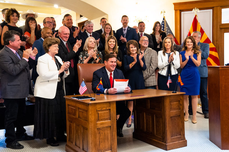 DougDucey's tweet photo. SIGNED: Historic legislation that makes an unprecedented $1 billion investment to secure Arizona’s water future. We are taking a bold step to do what the men and women of Arizona hired us to do — position our state for success today, tomorrow and for generations to come. 1/ https://t.co/wiadIt2g0h