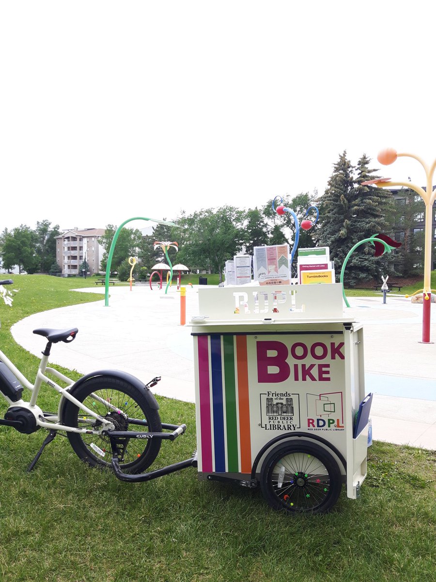 Join us at the Downtown splash park until 2:30pm today! The weather might not be great for playing in the water but it's perfect for the Book Bike! We have games, stories, scavenger hunts, and more! #RDPL #RDPLBookBike #RedDeer #yqf