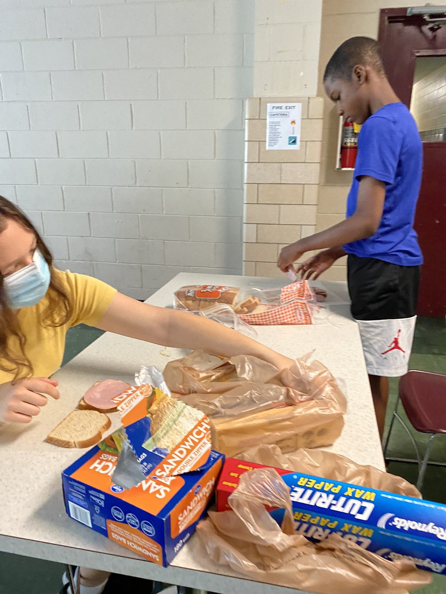 StBenCYM's tweet photo. Second service day; we talked about works of mercy, made lunch for those who come to the parish, washed some tables and chairs and mulched a bit.#welivetoserve https://t.co/ABJBKRIRJi