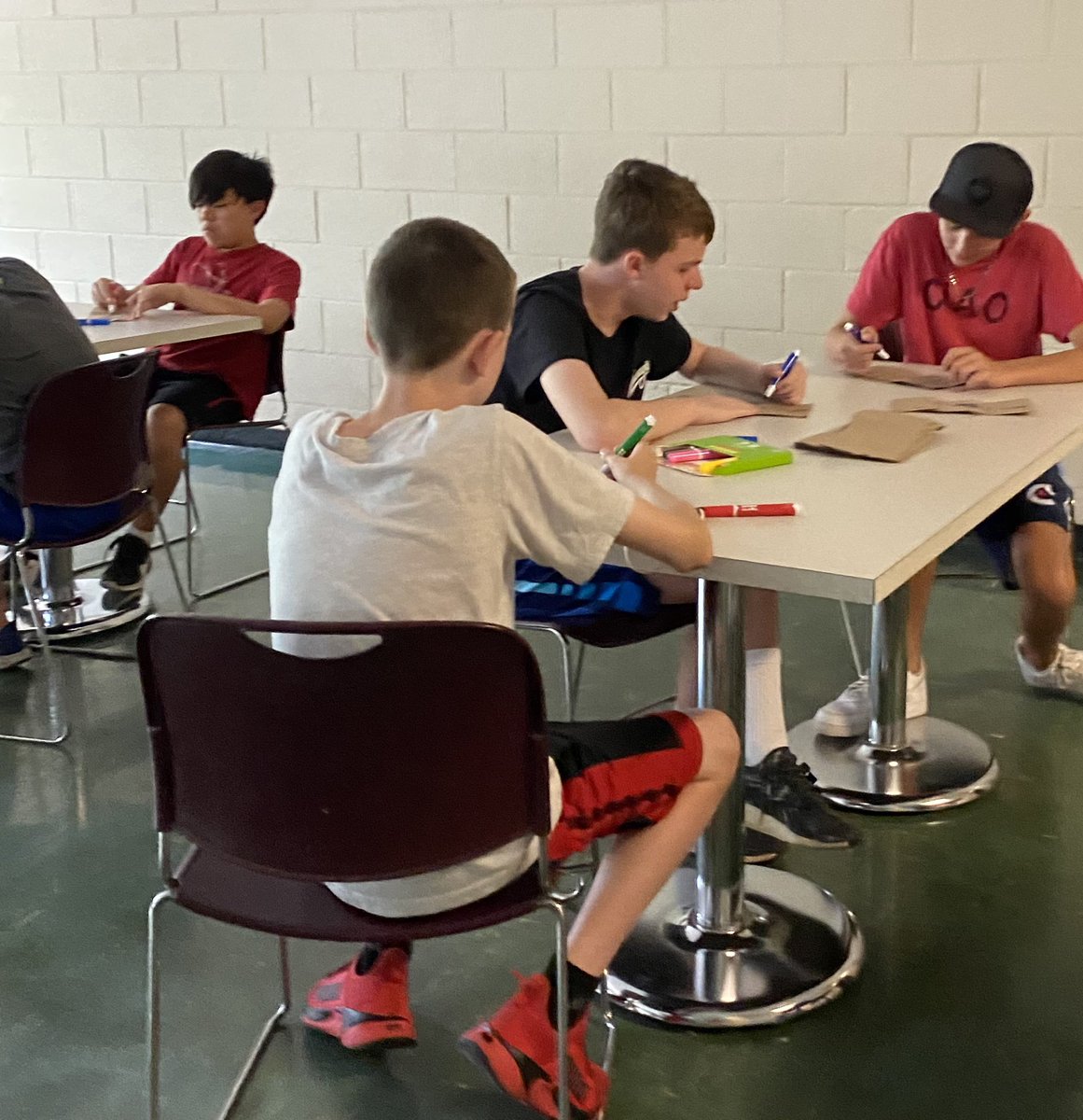 StBenCYM's tweet photo. Second service day; we talked about works of mercy, made lunch for those who come to the parish, washed some tables and chairs and mulched a bit.#welivetoserve https://t.co/ABJBKRIRJi