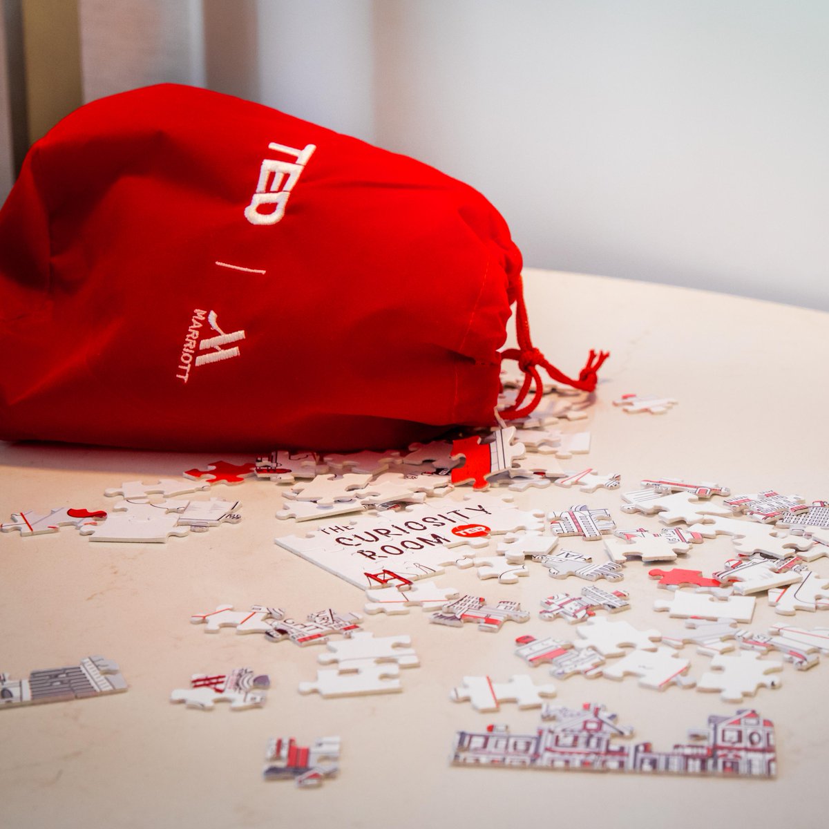 Marriott's tweet photo. ✨ENTER TO WIN A STAY IN THE CURIOSITY ROOM BY TED ✨

The Curiosity Room is a puzzle box just waiting to be solved. In partnership with TED, we've woven interactive &amp; mind-bending activities seamlessly into our themed guest room design. Enter now ➡️ https://t.co/0LzXe94eQz https://t.co/HSTnIlk9fB