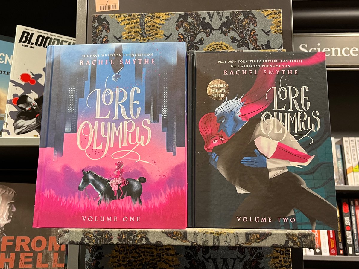 Always exciting to spot a physical copy of Lore Olympus in the wild! These are in <a href="/WaterstonesWton/">Waterstones Wolverhampton</a> (Wolverhampton, UK). You’ve reached far and wide <a href="/used_bandaid/">RachelSmythe @ Lore Olympus</a>! #loreolympus #NewRelease #hotoffthepress