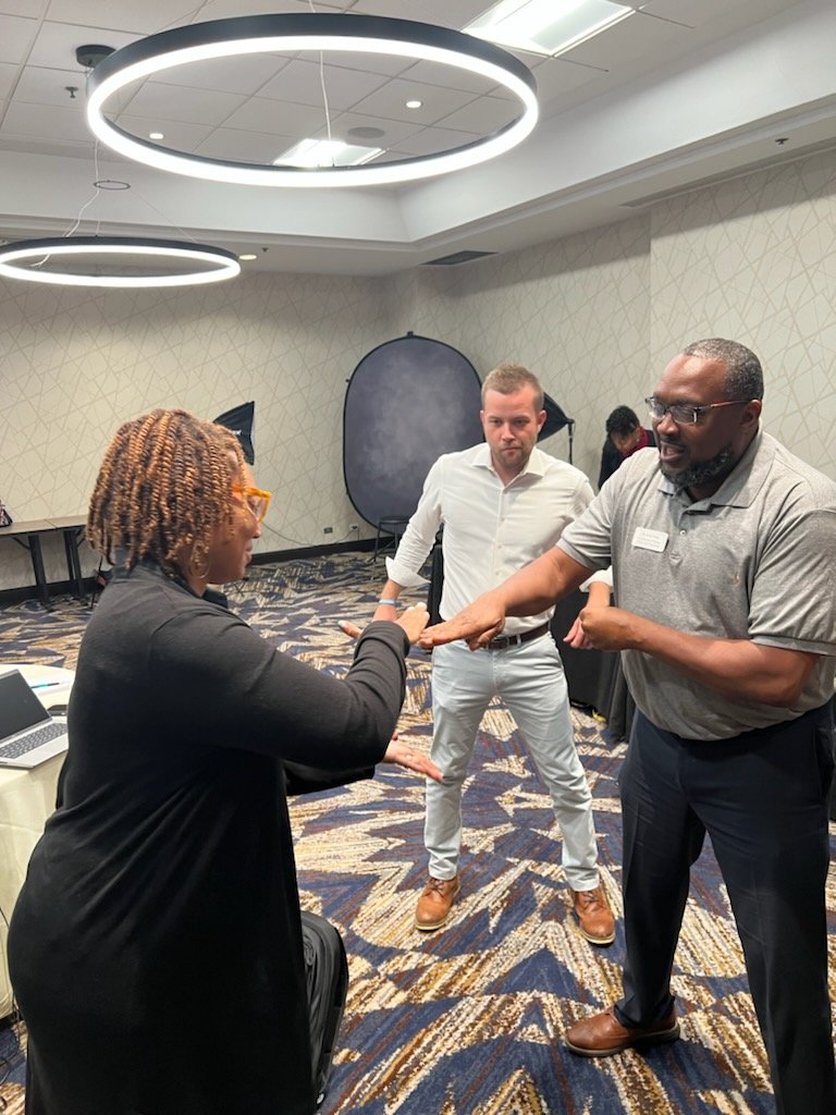 LinneaSGarrett's tweet photo. Some fun times at our retreat today! @TKoutavas_D227 presenting his TED talk and our annual RTHS rock, paper scissors competition! #richinstudentsuccess https://t.co/Jsb8GXeOax