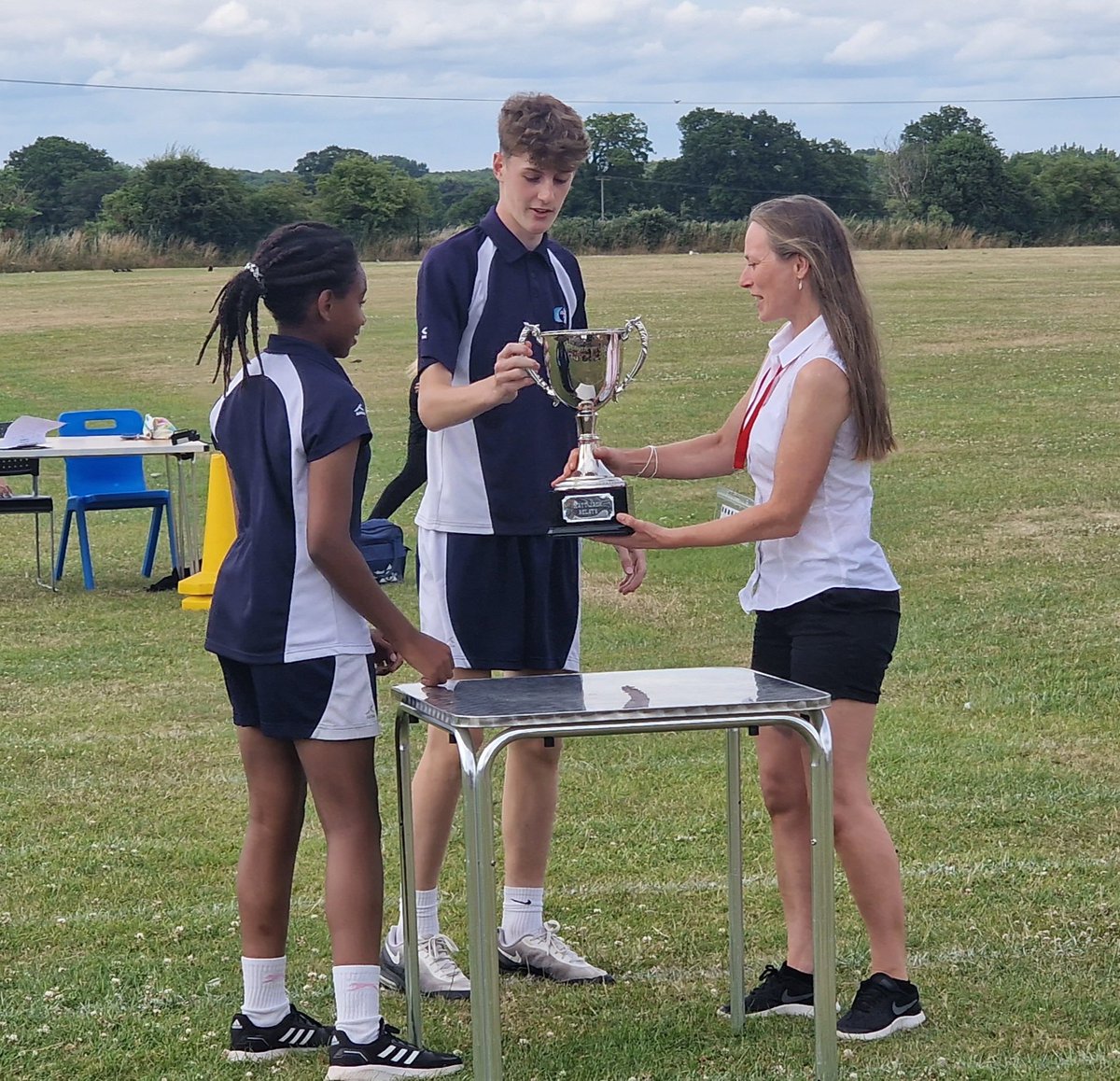 EastbergholtPE's tweet photo. What a wonderful way to honour Matt Jack at his inaugural Matt Jack relays event at EBHS. What a pleasure to host @PeClaydon  @ColchesterAcad and Matt's family to present the trophy. Well done to all the runners in what was a great team event. 🏃‍♀️🏃🏃‍♀️🏃 https://t.co/a9wNUwsAGZ