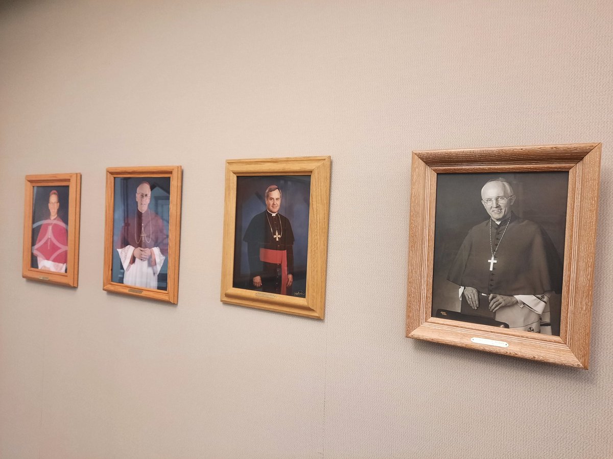 SHMBenedictines's tweet photo. #BHSummer22: Today's prompt from @bustedhalo calls us to remember a #RoleModel. But how can we choose just one? In our #monastic Chapter Room, the south wall honors our Prioresses, while the north wall commemorates the shepherds of @SFDiocese.
#YanktonBenedictines #Monastery https://t.co/HuzFlbEMdv