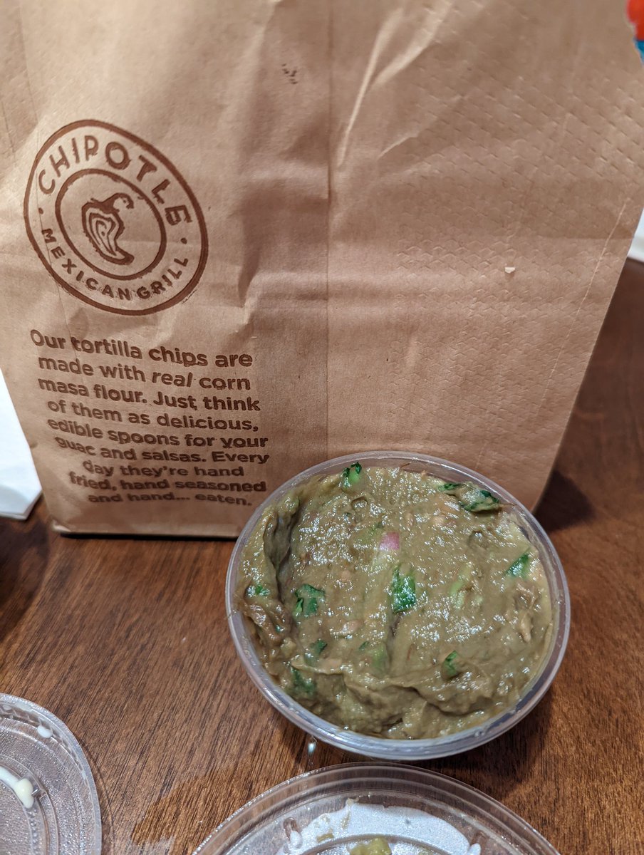 RealMiVo's tweet photo. Hey @ChipotleTweets can you help us out here? My wife orders and picks up a mobile order and this is our guac...c'mon man isn't guacamole supposed to be green? https://t.co/vVBooiEbNR
