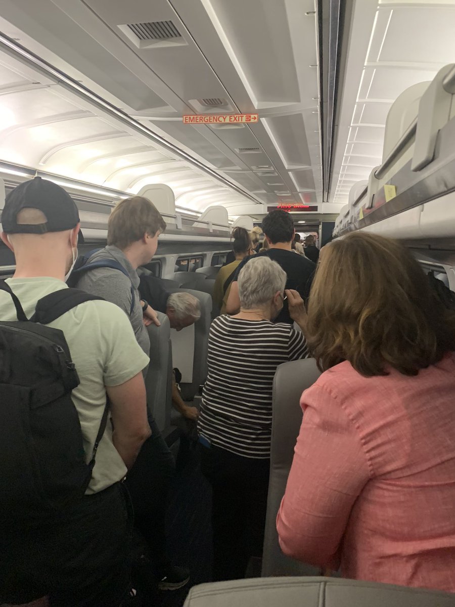 nit_inkr's tweet photo. @AmtrakNECAlerts Finally. Time to get off the 653 after 2+ hrs of being stranded. We still haven’t been informed about what really happened. Amtrak officials are still not sharing and the local news is spiralling scenarios. “Local authorities” are on site per the Amtrak in-app notification. https://t.co/BJkXYxWZPC