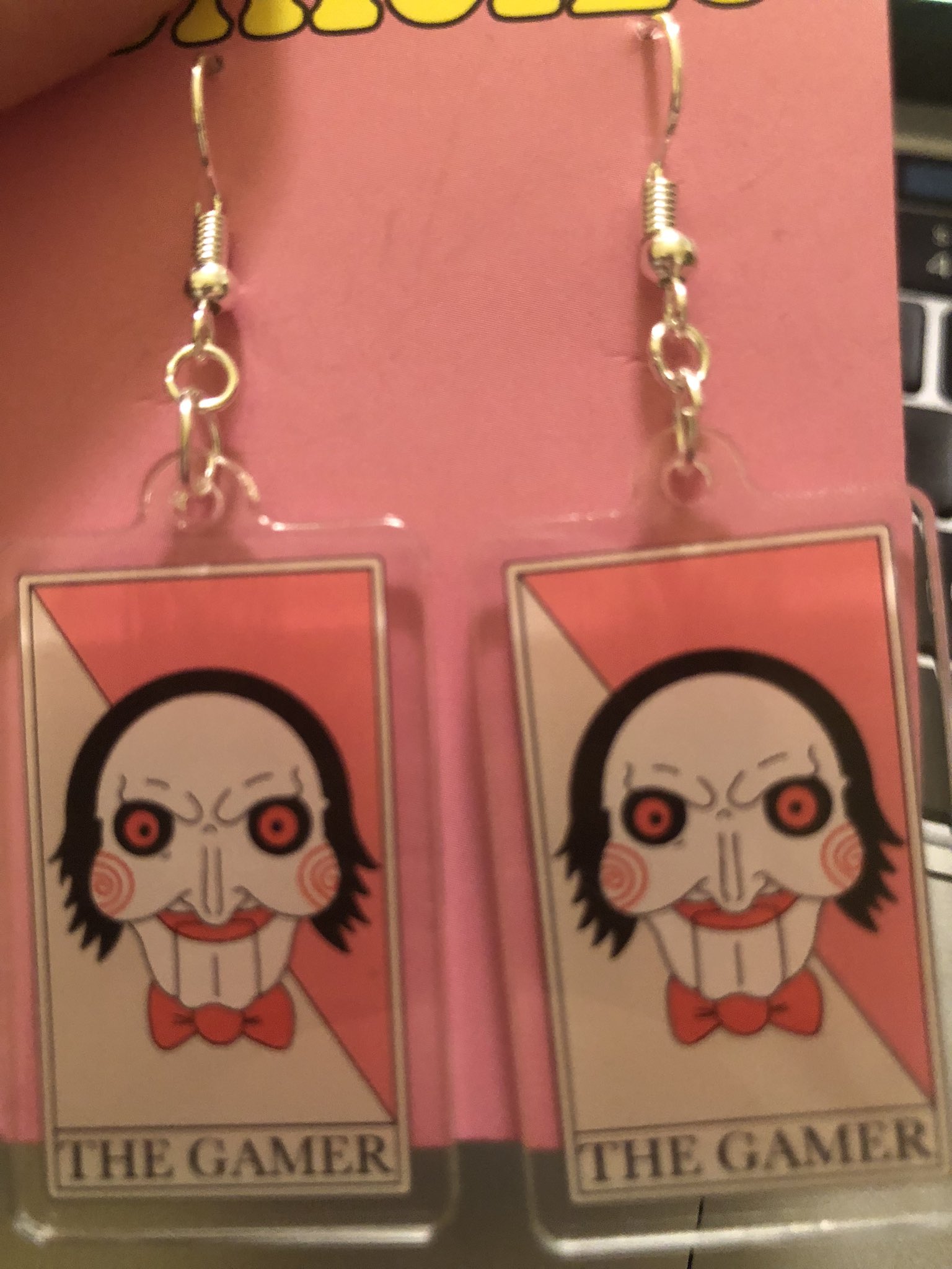 Nicolas cage hotsell earrings