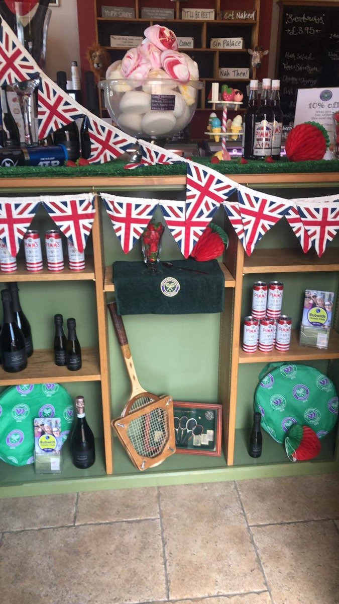 bubwithtennis's tweet photo. We're loving the Wimbledon-themed display at the @JugandBottleBub. Make sure you visit them for your Pimms', strawberries and cream https://t.co/YIcgAo83M1