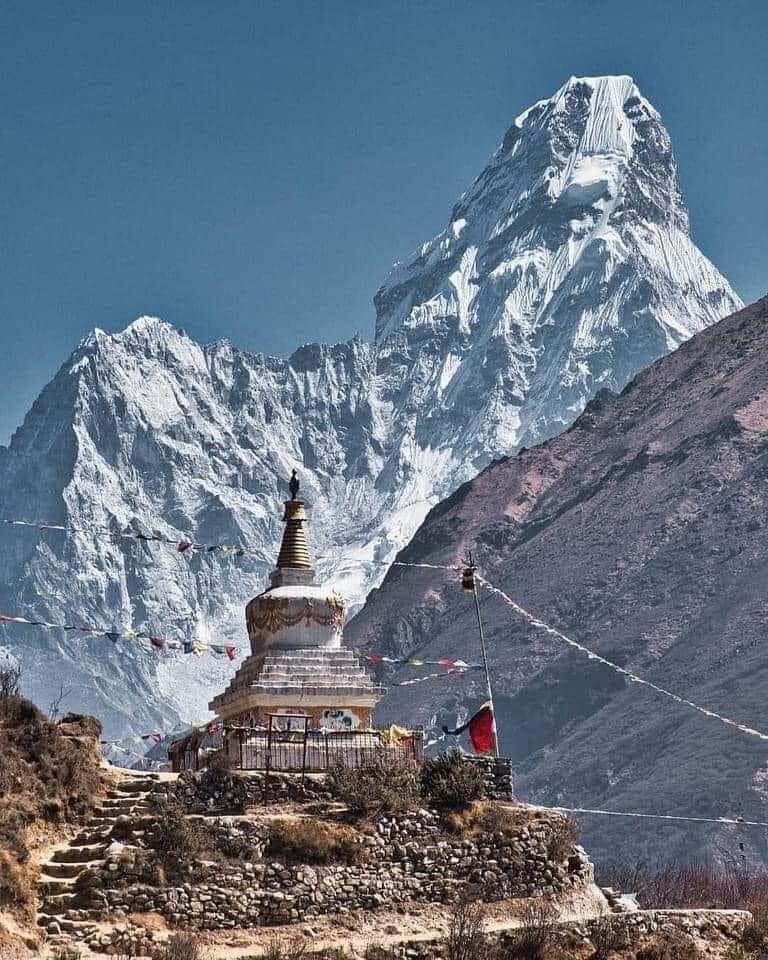Mt.Ama Dablam ❤️🇳🇵🙏

Ama Dablam is a mountain in the eastern Himalayan range of Nepal. The main peak is 6,812 metres (22,349 ft), the lower western peak is 6,170 metres (20,243 ft). Ama Dablam means "Mother's necklace"; the long ridges on each side like the arms of a mother.