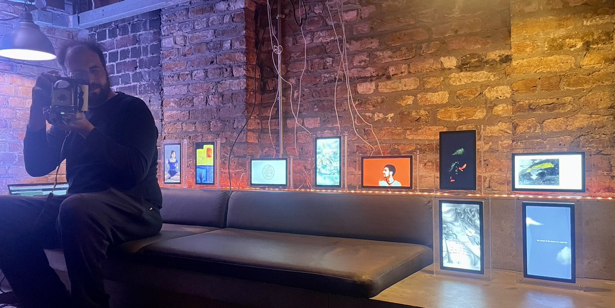 theVERSEverse's tweet photo. day 2 of @prooofofpeople, we are ready for you💥

come meet VERSA, our emergent AI poet, and view our @infiniteobjects gallery, w works by @natallman @annaxmalina @manyplums @NaiboVisuals @in_cloudlands @kimsiew8 @itsstilltoomany @christianbok @nathanielstern @HPictur @GuysWily https://t.co/3ieWkYmimW