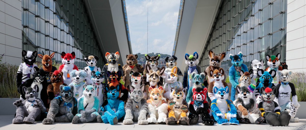 On top of the world with the <a href="/FursuitsByLacy/">Fursuits By Lacy</a> crew at Anthrocon 2022! ☀️ #ac2022