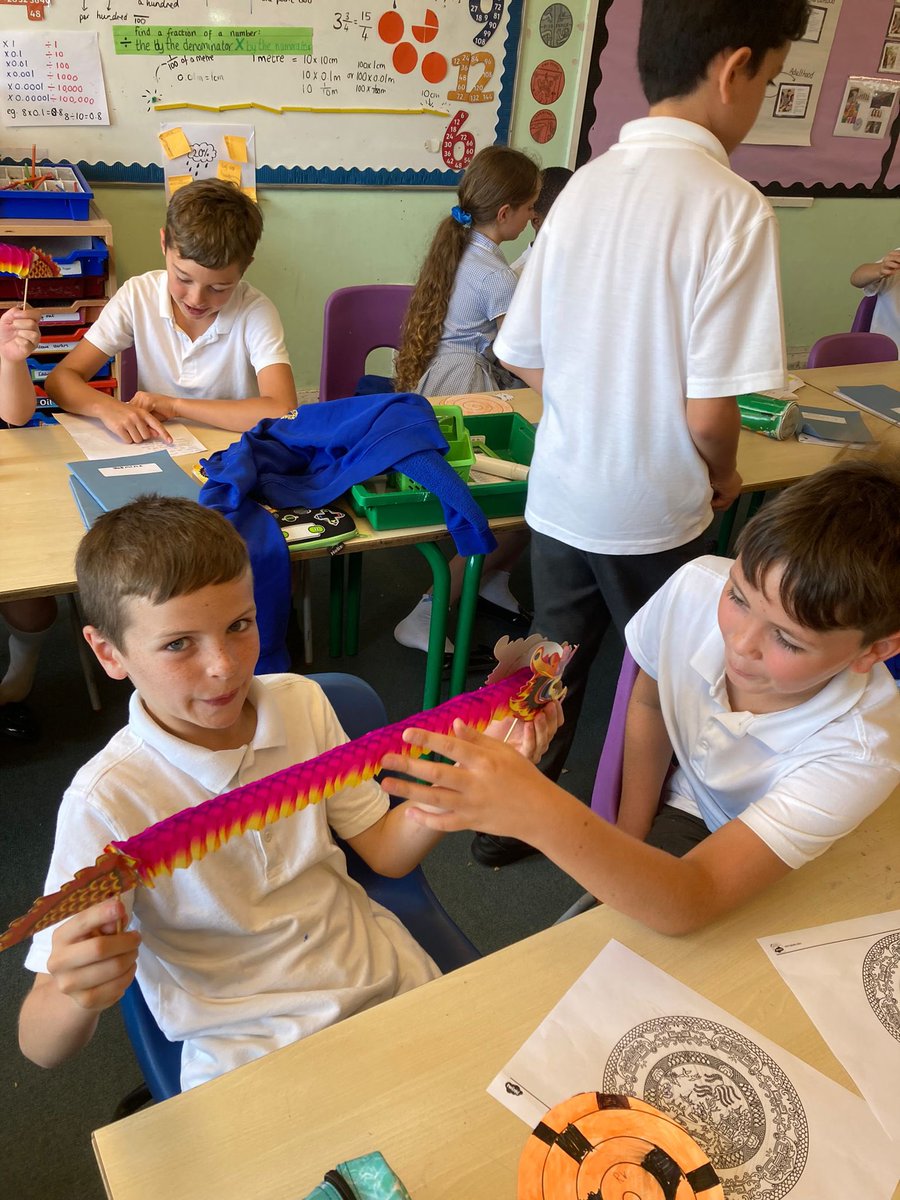 TewinCowper's tweet photo. Year 5 spent Countries and Cultures day learning about Chinese culture. Thank you Brandon for sharing Chinese dragons, lanterns - and delish Pineapple Buns! 🍍 https://t.co/UFZaK37YSv