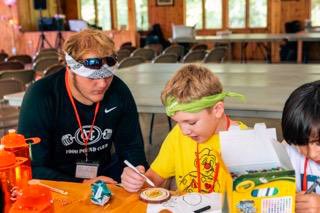 MCFootballCoach's tweet photo. Great to see our Hawks give time to volunteer at @CampAmplify this past week ! Proud of the men they are becoming off the field of play @NicDenick @cooper_bothwell @bryce_bothwell and @AidanBanfield68 .  #Mindset https://t.co/TOUQ7qKiLw