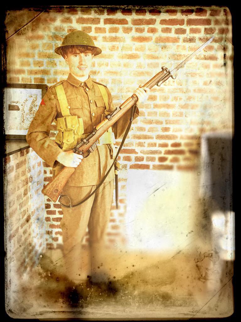 SibfordHistory's tweet photo. Essex Farm Cemetery, looking for Valentine Strudwick , age 15. Private Fin Pankhurst trying on WW1 uniform. #BeYouBeSibford #YpresSalient #AngliaTours https://t.co/q76evPb9s7