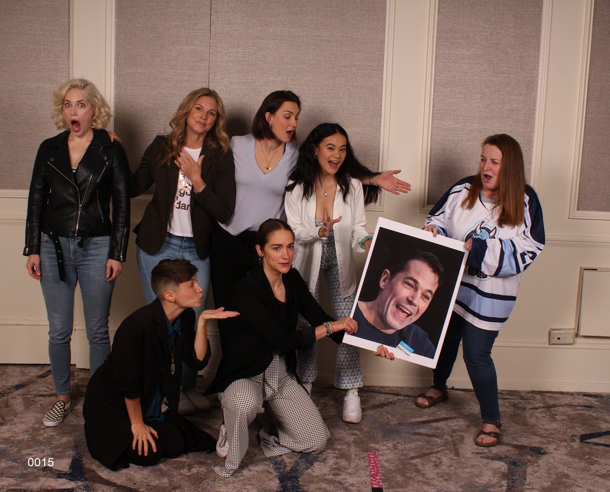 staylor111's tweet photo. We aren't the only ones who love #FakeTimRozon! As soon as I showed it to the cast, Melanie grabbed for it  and the tug-of-war ensued. I just love this photo!

#WynonnaEarp #BringWynonnaHome #EarpFest2022 https://t.co/3xApoGUhUW