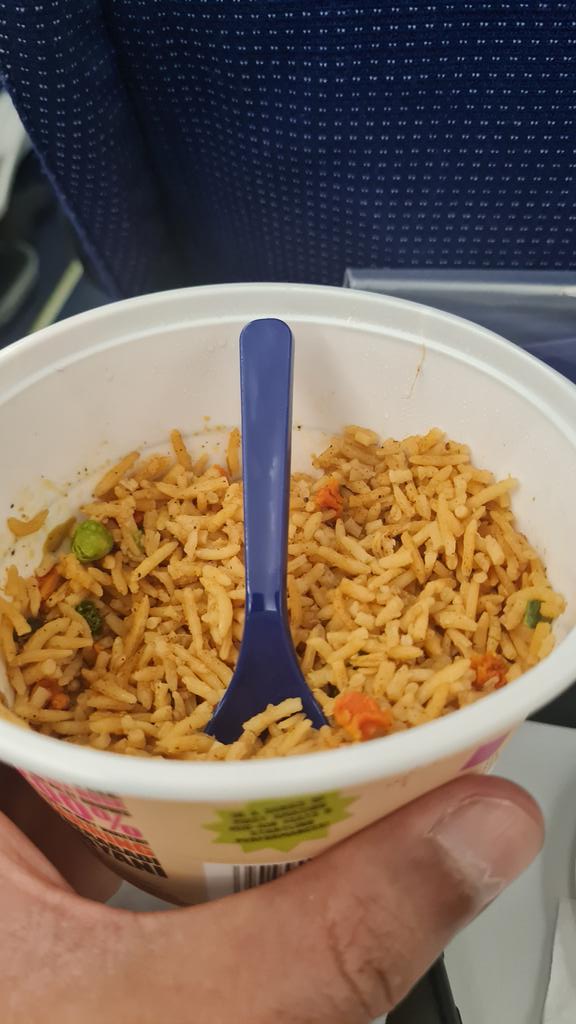 NamitG07's tweet photo. If the 6E mgmt had to eat the Hyderabadi Biryani which they serve us for a week, I wouldn't be surprised if they quit!
Tasteless and dry. Basically inedible.
I gave up after 3 spoons.

It's amazing that you have the nerve to charge for it! 
6E only if theres no choice.
#Indigo6E https://t.co/zgT0XUQT3n