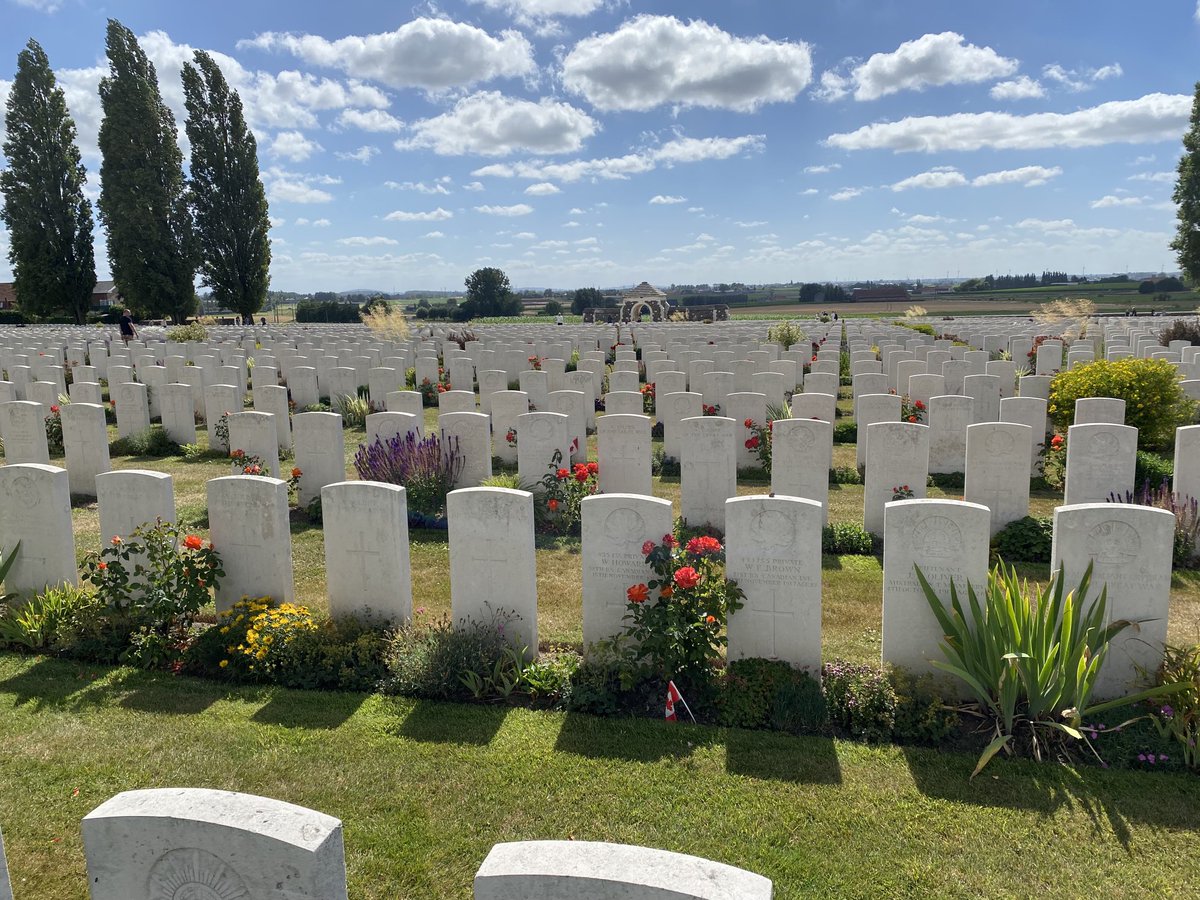 Student reflect in the serenity of Tyne Cot, the largest British and Commonwealth cemetery in the world