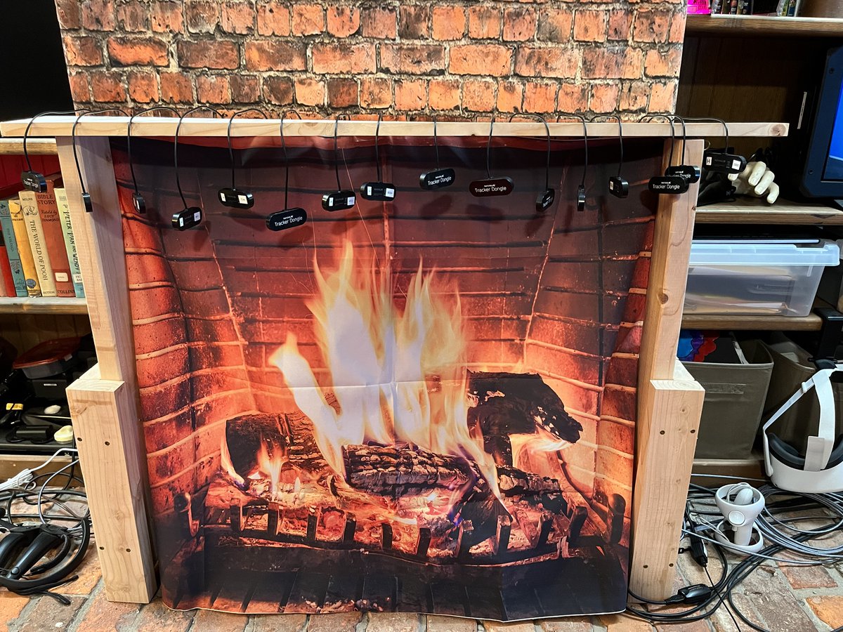 iFilmFlops's tweet photo. I know it’s not Christmas yet, but the dongles look like stockings on our fake fireplace. We are a @ManusMeta family 😀! #mocap #vrfilmmaking https://t.co/S3kt5lKD6L