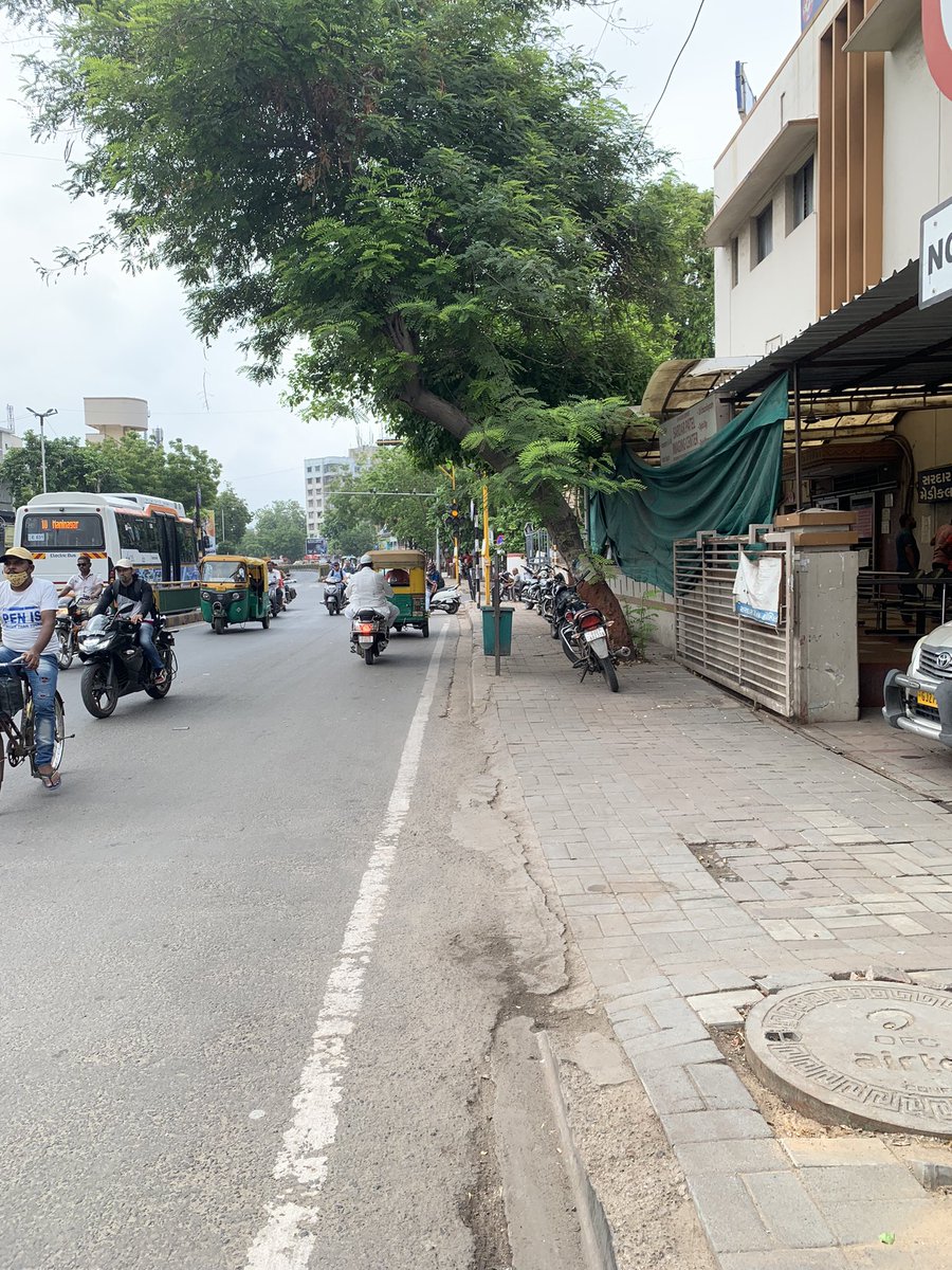 Jeet4482's tweet photo. Sir @sanghaviharsh people always go wrong side on this road at maninagar, Ahmedabad. It is good if you instruct police to place camera on this side and issue memo which will help to stop people from breaking rules. There is also hospital on this road. Please look into this sir. https://t.co/HAxaE8fuwr