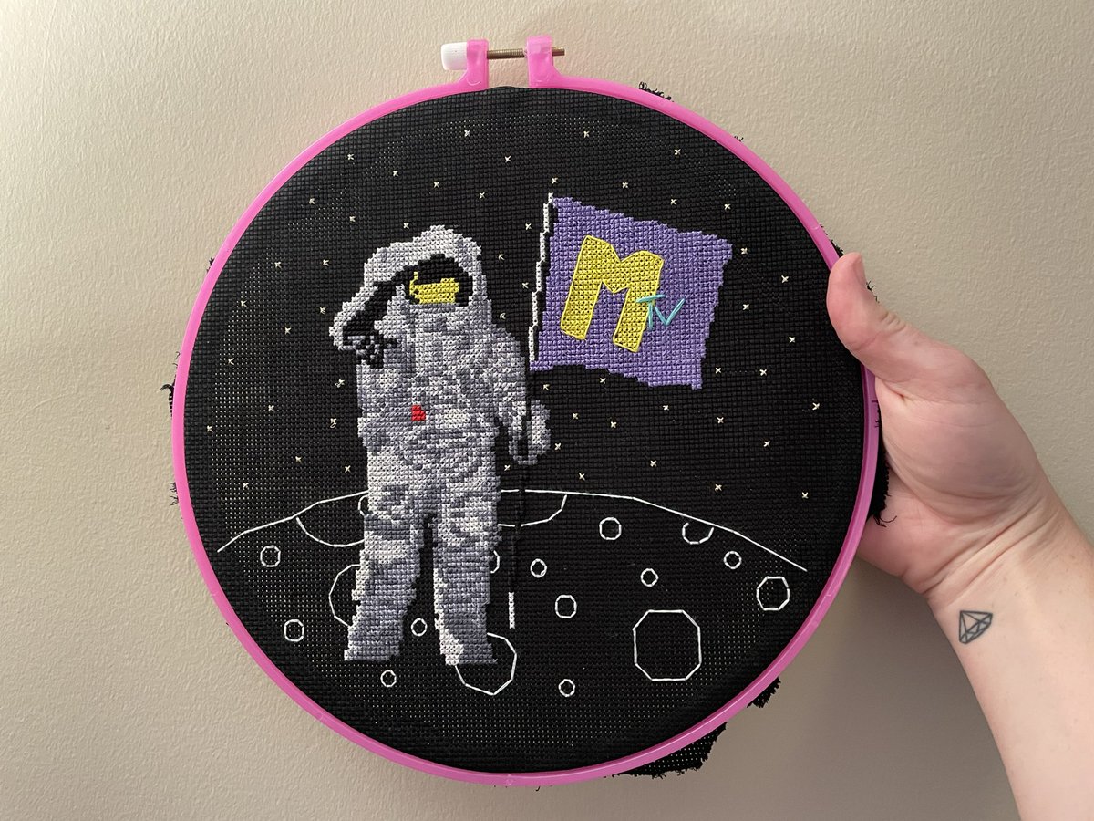 AlexPalombo's tweet photo. Interested in this MTV Moonman cross stitch? I’m raffling it off!

Here’s how to enter the raffle:

1. Donate $10 to @savethemusicfdn here: https://t.co/zbCwMUYBHC
2. DM me the receipt by 12 PM ET on July 25. 

I’ll draw a winner on July 25. Good luck! 🧵 https://t.co/hKWHrzbOG6